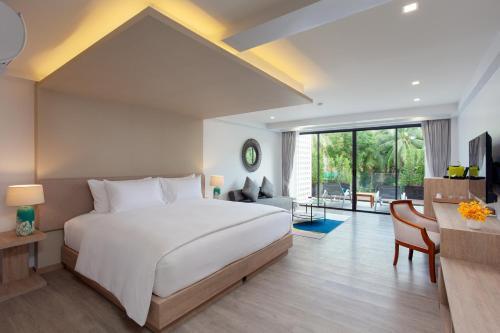 Anona Beachfront Phuket Resort - Tap to explore photos