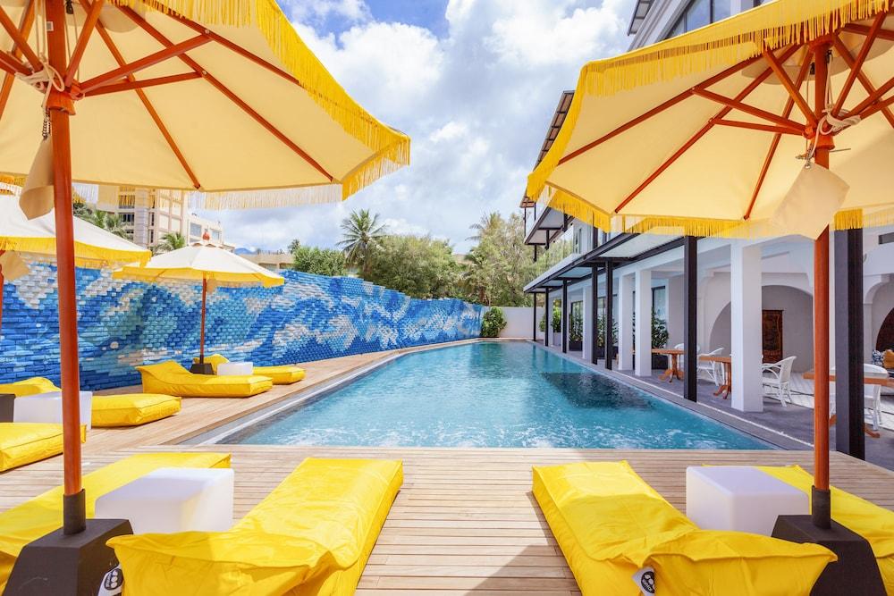Anona Beachfront Phuket Resort - Tap to explore photos