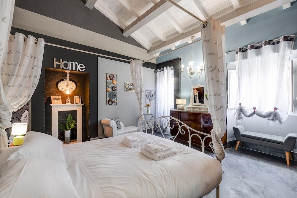 Rome As You Feel - Torre Design Apt. - Tap to explore photos