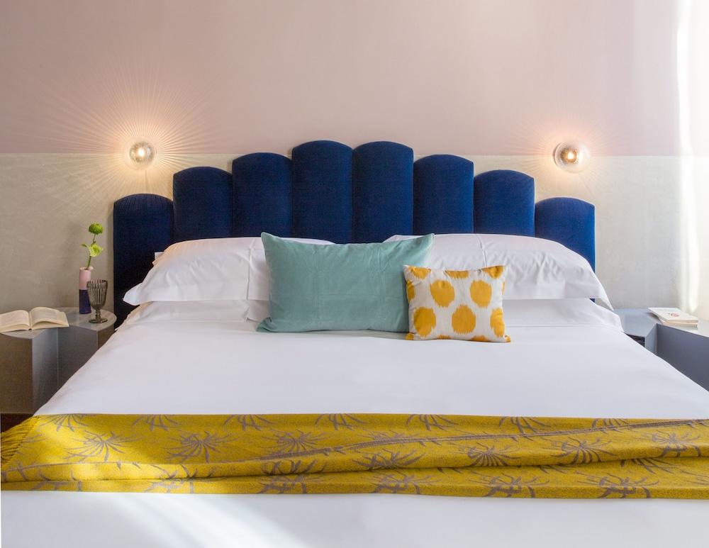 Condominio Monti Boutique Hotel - Tap to explore photos