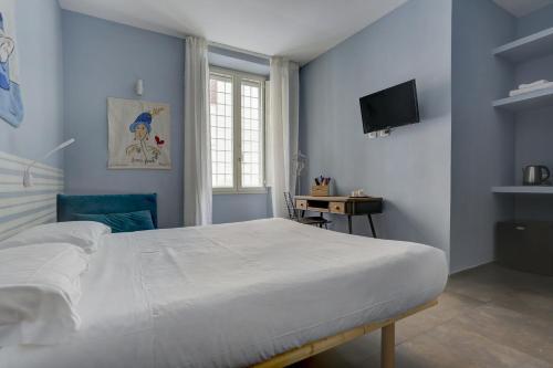 CAPO D'AFRICA 30 - COLOSSEO Room Type - Triple Room with Private Bathroom