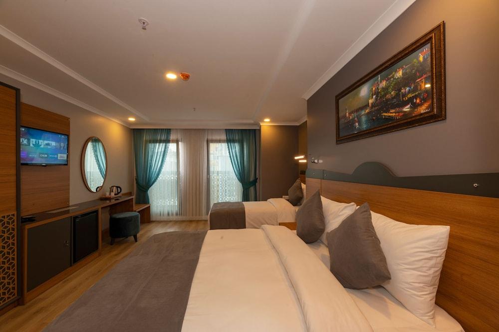 New Emin Hotel - Tap to explore photos