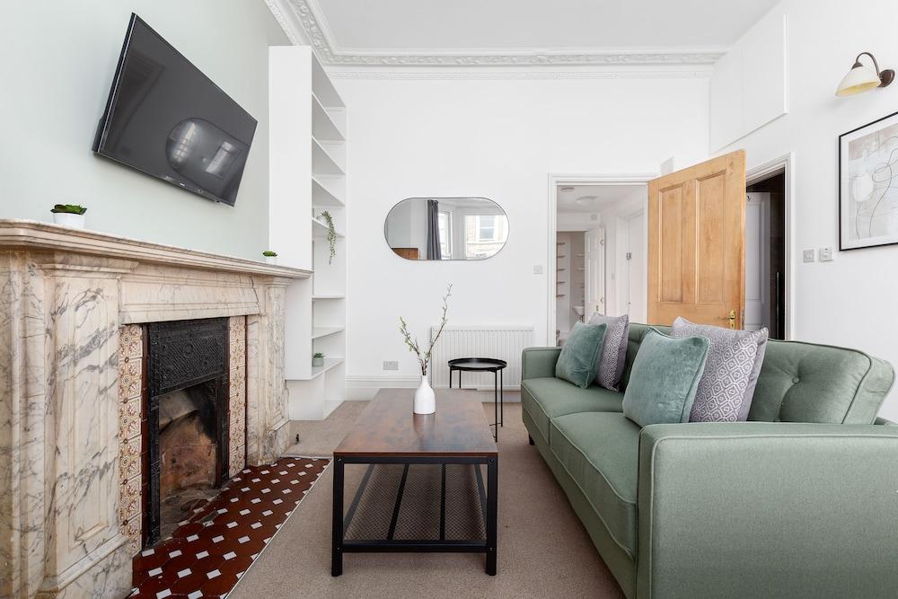 The Kensington Penthouse - Tap to explore photos