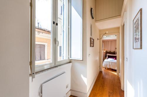 Roman Loft Steps from Piazza Navona IREX Apartment - Tap to explore photos