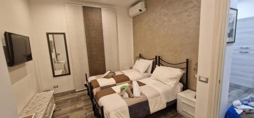 R.&T. Suite House Roma - Tap to explore photos