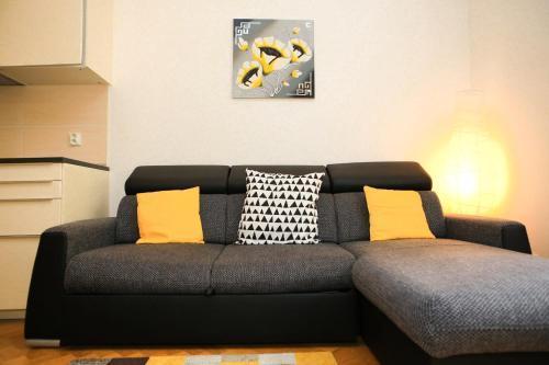 Yellow apartment Flora - Tap to explore photos