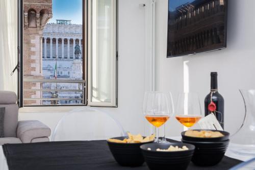 Piazza Venezia White Apartments - Tap to explore photos