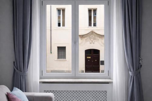 Rome Deluxe Apartments - Tap to explore photos