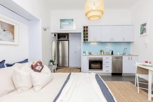 COZY BEACH FRONT STUDIO WITH AIRCON Room Type - One-Bedroom Apartment