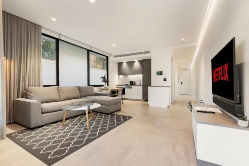 Modern 1BR Abode w Courtyard Steps to the Beach - Tap to explore photos