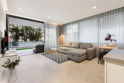 Modern 1BR Abode w Courtyard Steps to the Beach - Tap to explore photos