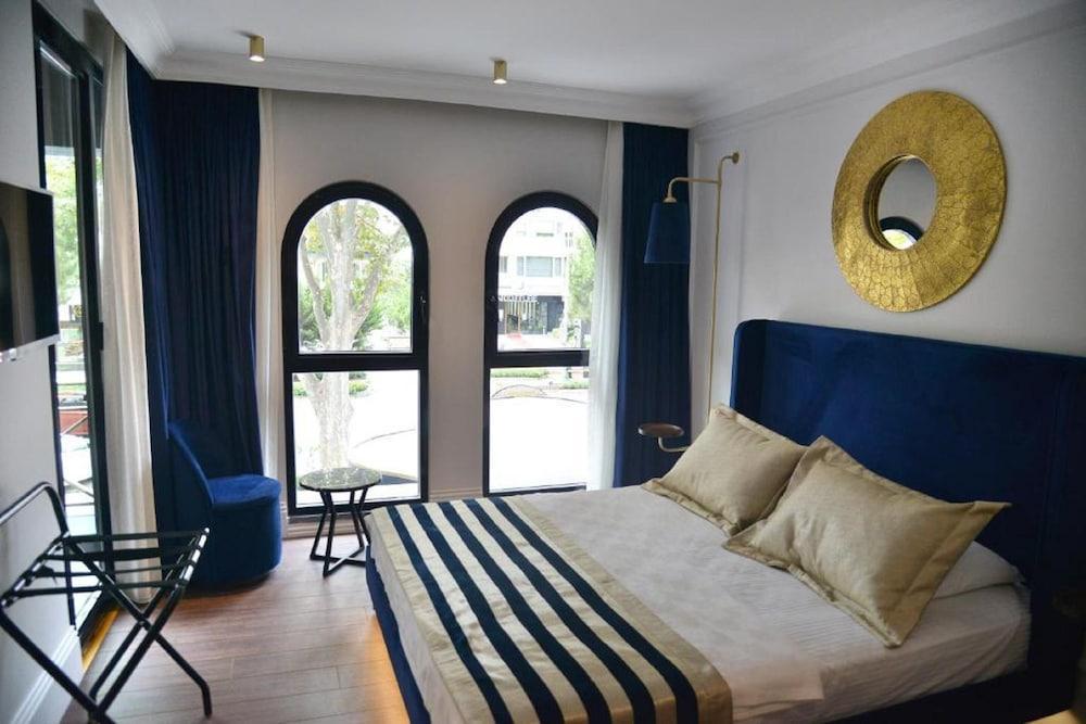A11 Exclusive Hotel - Tap to explore photos
