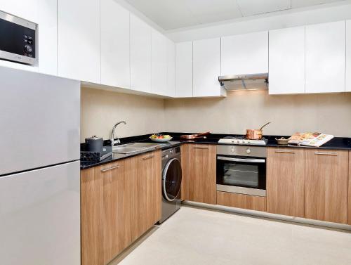 Staybridge Suites - Doha Lusail by IHG Room Type - One-Bedroom King Suite with City View