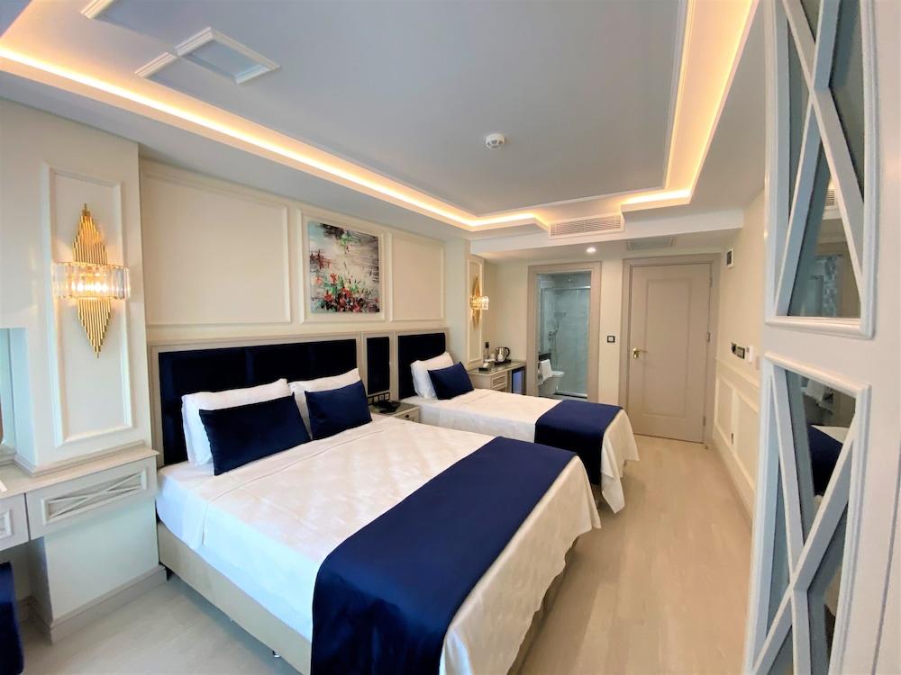 Omma Hotel Room Type - Deluxe Triple Room