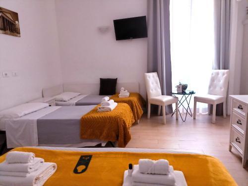 AD Cavour Luxury Rooms - Tap to explore photos