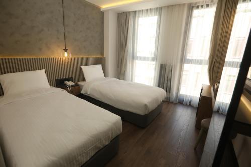 Moja City Hotel - Tap to explore photos