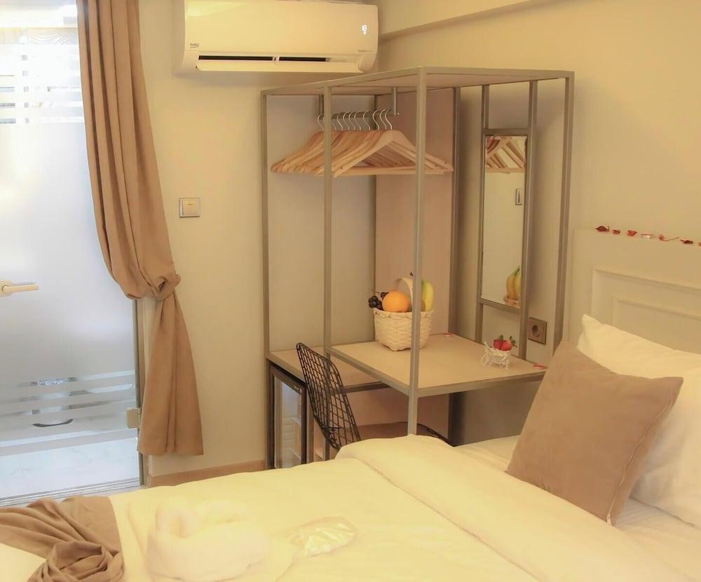X-Nellyi Boutique Hotel Room Type - Economy Triple Room