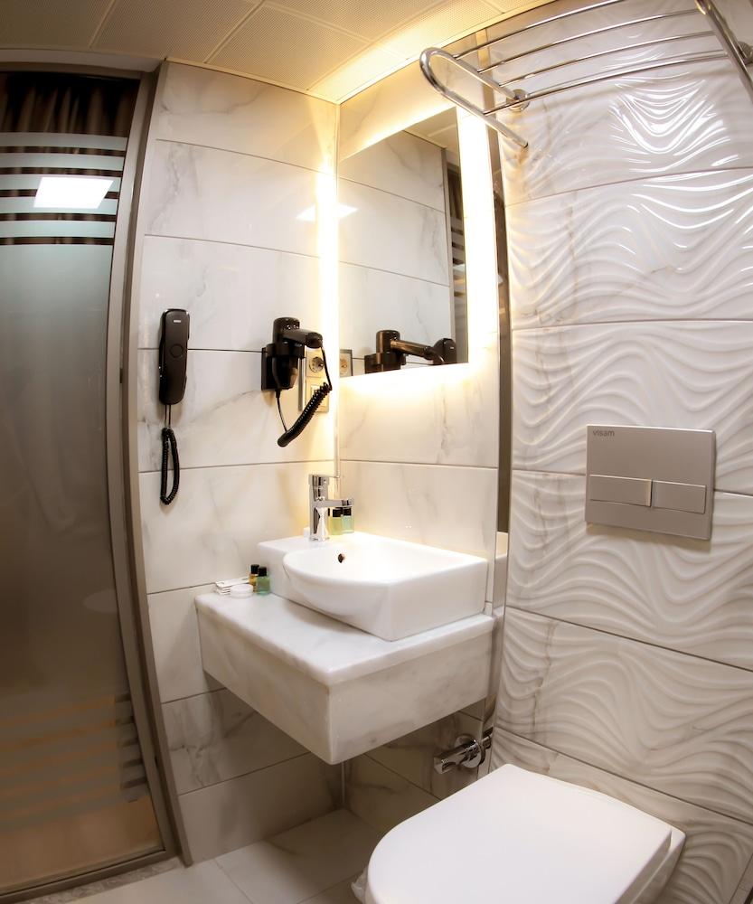 X-Nellyi Boutique Hotel - Tap to explore photos