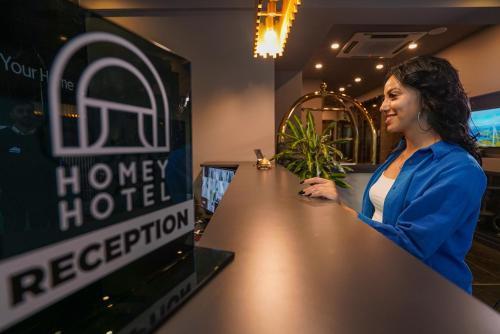 Homey AirPort Hotel - Tap to explore photos