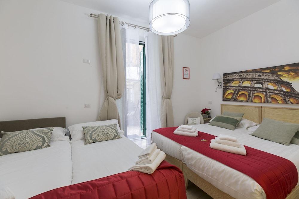 Flatinrome Trastevere Deluxe Rooms - Tap to explore photos