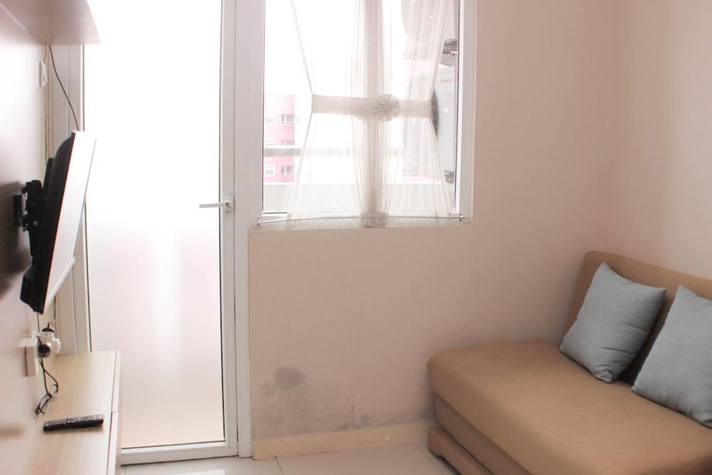 Well Designed And Serene 2Br At Green Pramuka City Apartment - Tap to explore photos