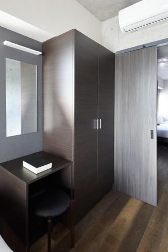 Prime Suites Tokyo - Tap to explore photos