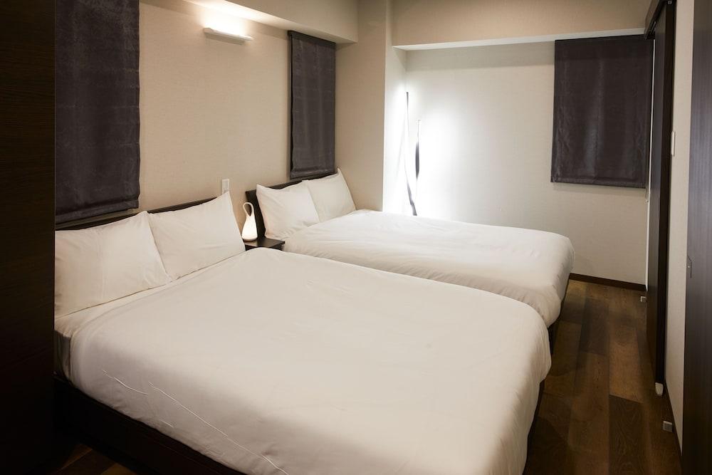 Prime Suites Tokyo - Tap to explore photos
