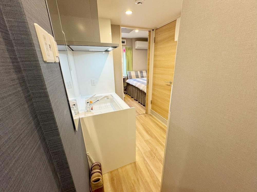 Shinjuku Warm House - Tap to explore photos