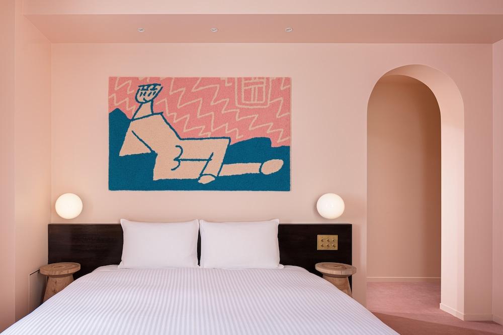 BnA_WALL Room Type - Superior Queen Room Non Smoking, "A room with pink carpet"