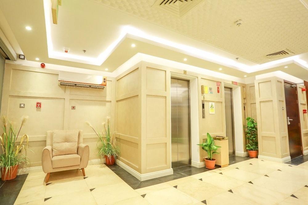 Oyyo Plaza Hotel Apartment - Tap to explore photos