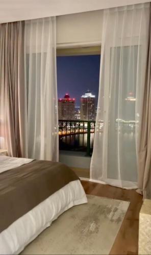 Beachfront Luxury Apartment-Pearl Island شقه مطله على الشاطئ بجزيرة اللؤلؤه