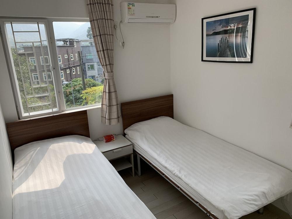 City Oasis Guesthouse - Tap to explore photos