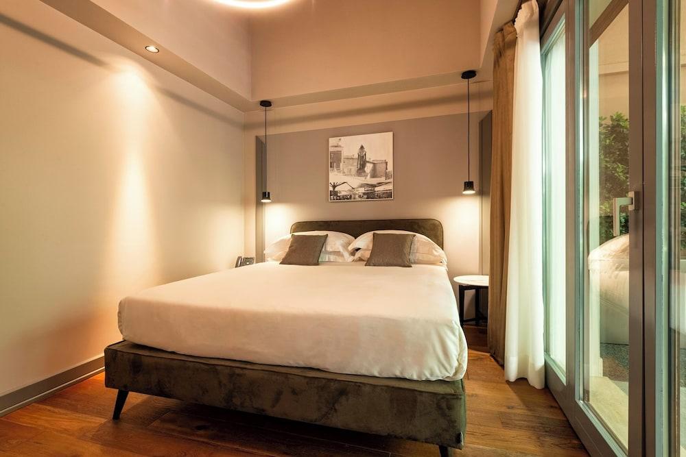 Loly Boutique Hotel - Tap to explore photos
