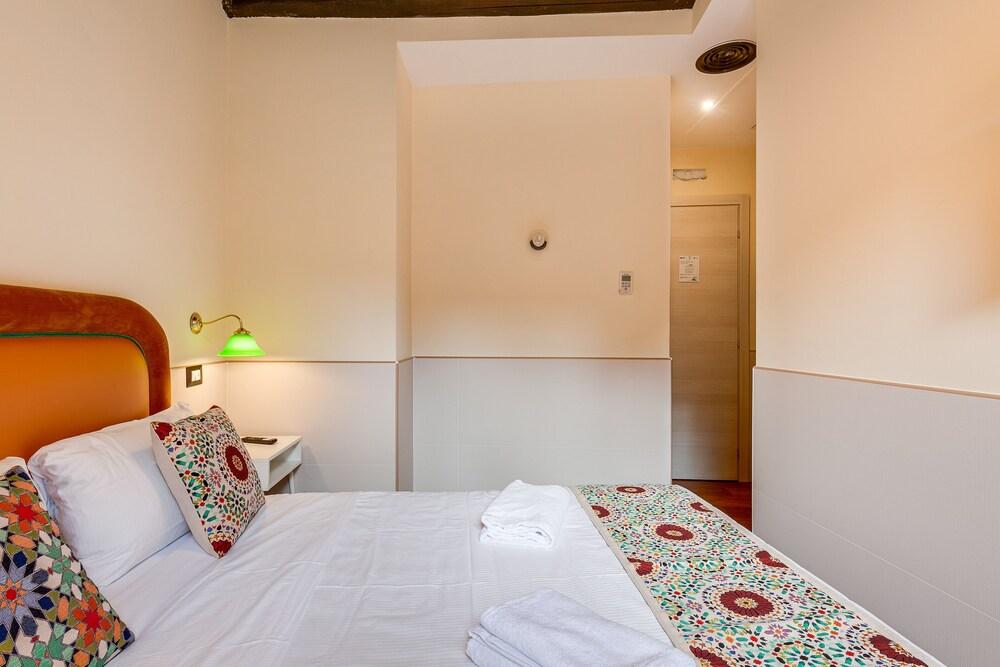 Habitat Monti Rooms - Tap to explore photos
