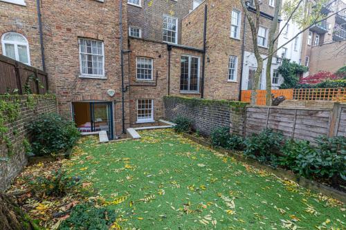 Stylish flat with garden in Notting Hill - Tap to explore photos