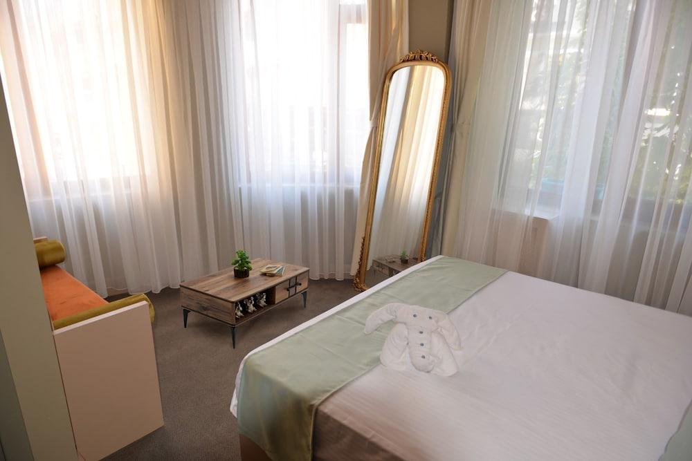 By Kinyas Hotel Room Type - Deluxe Room
