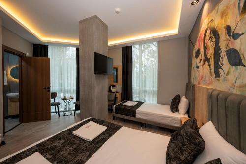 Comfort Point Room Type - Deluxe Triple Room Comfort Point Room Type - Deluxe Triple Room