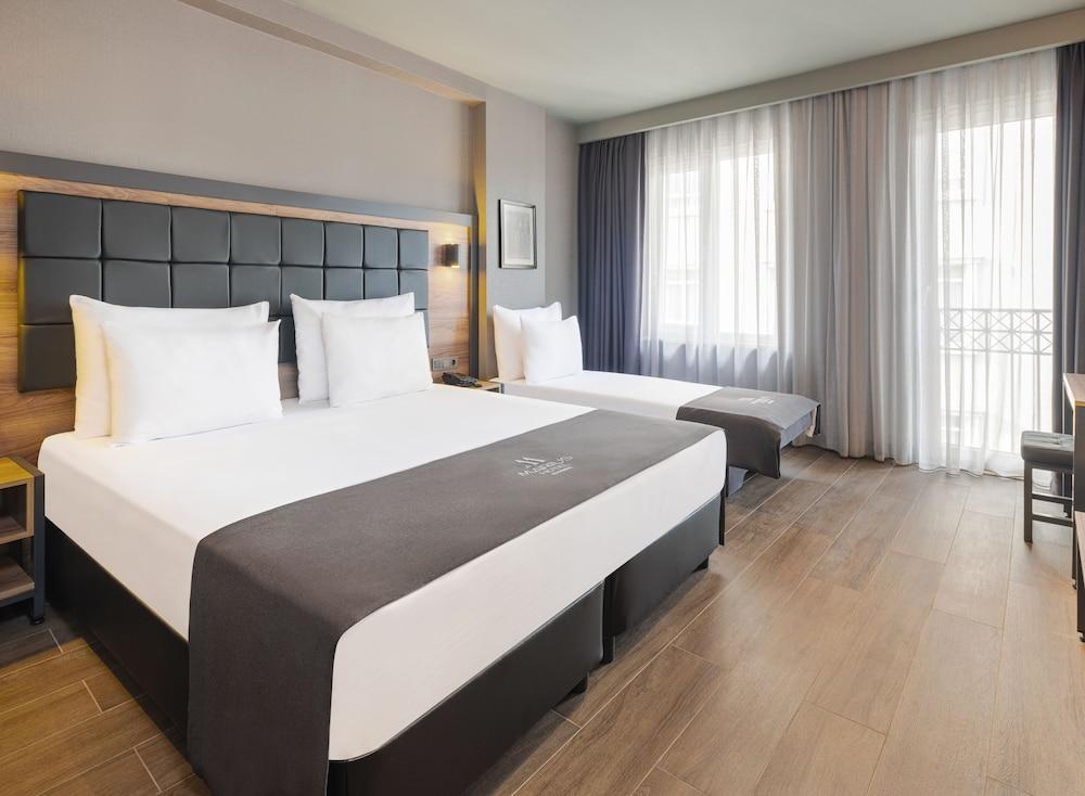 Marius Hotel Room Type - Deluxe Triple Room Marius Hotel Room Type - Deluxe Triple Room