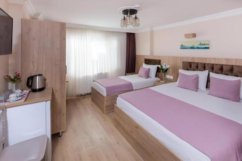 Grey House Room Type - Triple Room