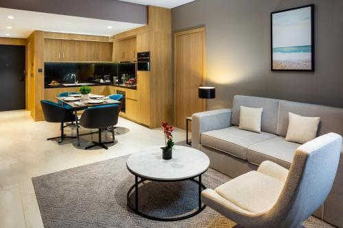 Millennium Place Mirdif Apartments - Tap to explore photos