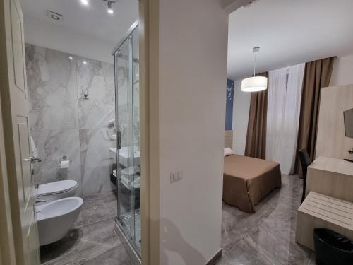 Joyful Termini Boutique Guest House - Tap to explore photos