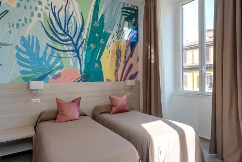 Joyful Termini Boutique Guest House - Tap to explore photos