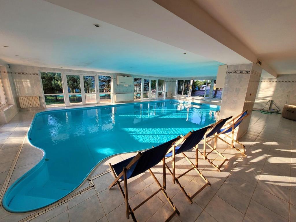 Wellness Aqua House - Tap to explore photos