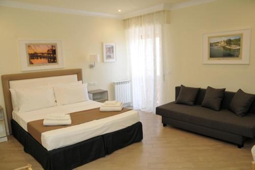 MIGDAL Luxury Suites Roma Testaccio - Tap to explore photos