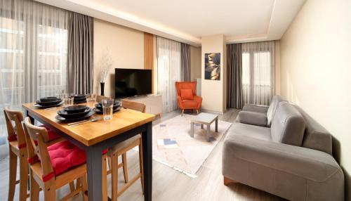 Family Time Suites Hotel - Tap to explore photos