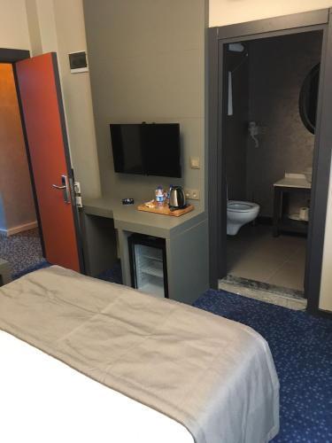 Acar Suite Hotel - Tap to explore photos