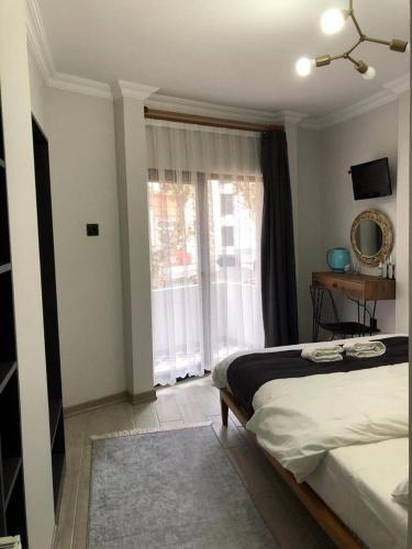 Valeria House Room Type - Deluxe Double Room with Balcony