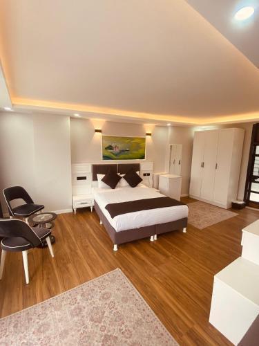 Hodegon Suite Hotel - Tap to explore photos