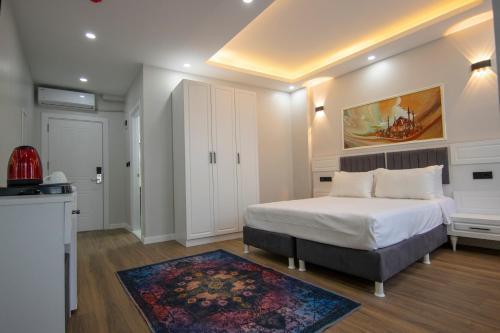 Hodegon Suite Hotel Room Type - Standard Triple Room Hodegon Suite Hotel Room Type - Standard Triple Room