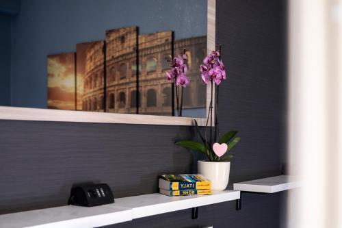 Dulcis In Colosseo Apartments - Tap to explore photos